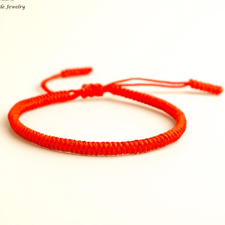 Bracelet fil rouge tibetain authentique porte bonheur
