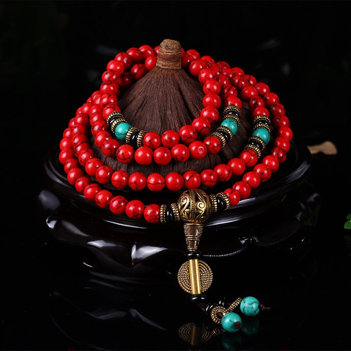 Bracelet Mala tibetain en pin rouge