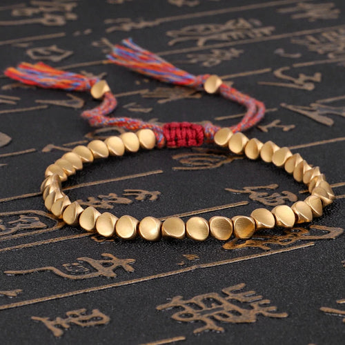 Bracelet tibetain en perles de cuivre tresse à la main